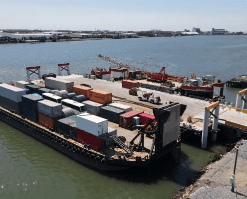 a barge loaded with containers